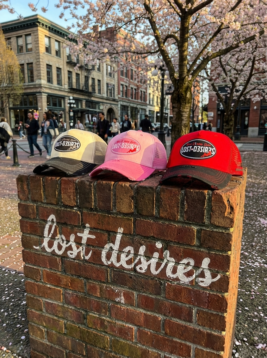 “Bad B’s Luve Lost Desires” Trucker Hats
